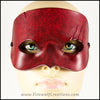 A handmade leather mask with 3 scars slashing across one eye, dyed and painted a mottled red reminiscent of blood. By Erin Metcalf of Eirewolf Creations.