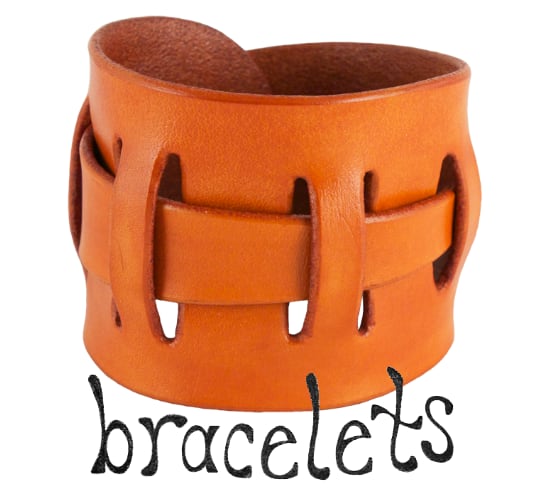 Handmade leather wrist cuff bracelets, leather jewelry by Eirewolf Creations.