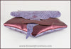 Handmade leather belt pouches in a medieval style with a scaled dragon skin texture, in purple or silver colors. By Erin Metcalf of Eirewolf Creations.