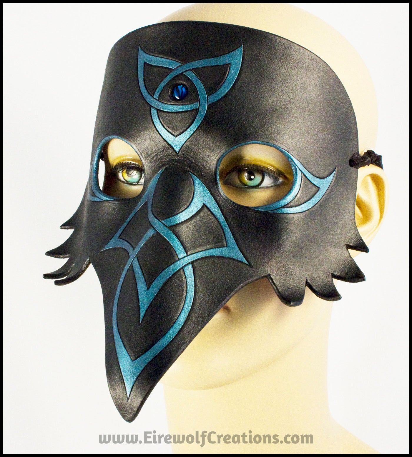 Celtic Raven mask with blue paua shell and iridescent teal Celtic knots, handmade leather masquerade mask, crow black bird, elegant Mardi Gras or Halloween costume