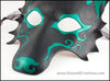 Spiral Wolf handmade leather masquerade mask with asymmetrical spiral designs, Mardi Gras or Halloween costume, blue or green on black