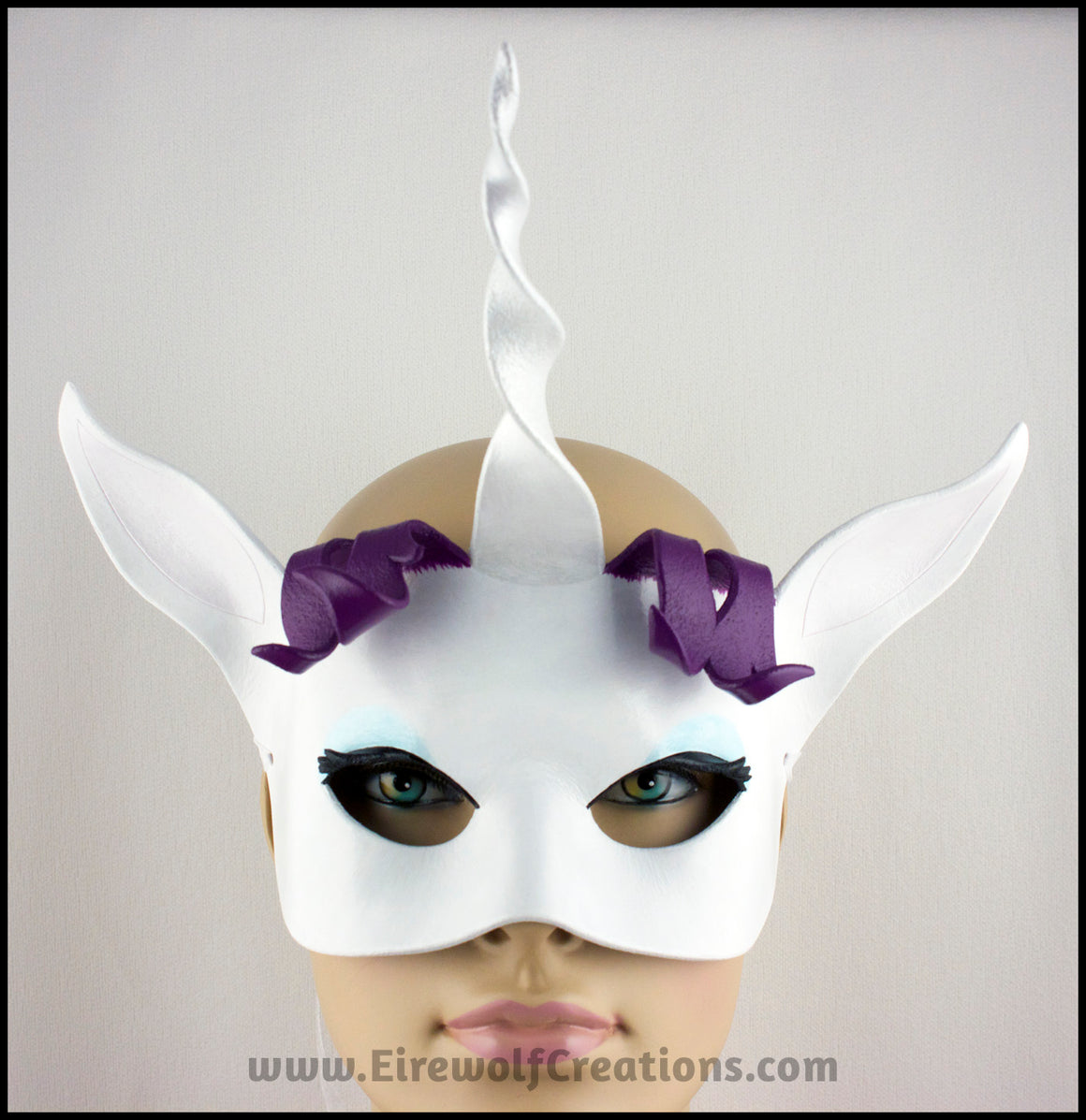 Cartoon Unicorn Rarity mask, handmade from leather for a masquerade costume or My Little Pony cosplay. By Erin Metcalf of Eirewolf Creations.