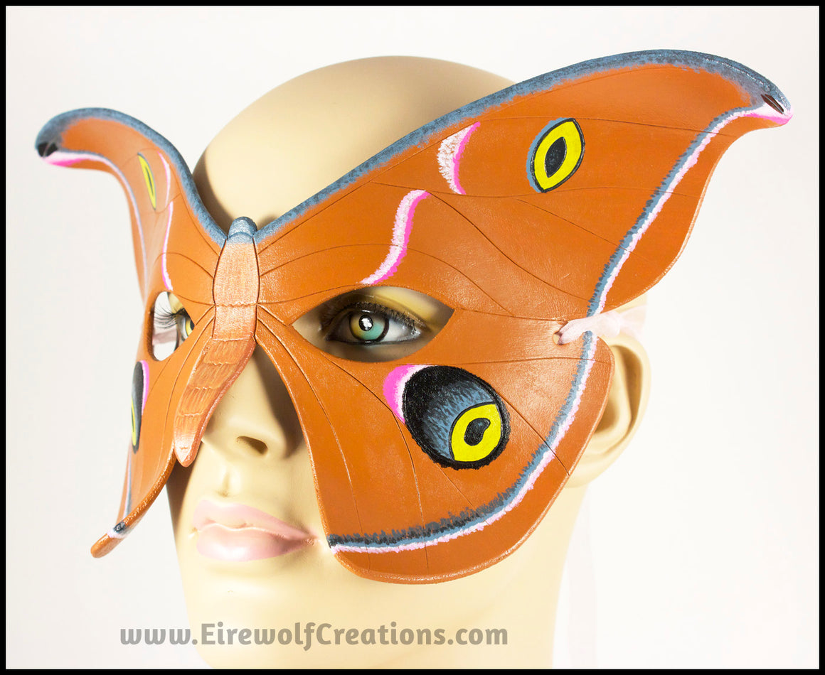 Handmade leather moth mask for a masquerade costume, handpainted to resemble the Antheraea Polyphemus moth. By Erin Metcalf of Eirewolf Creations.