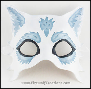 Silver Wolf half mask for a masquerade costume, handmade from leather and painted white with silvery fur details. By Erin Metcalf of Eirewolf Creations.